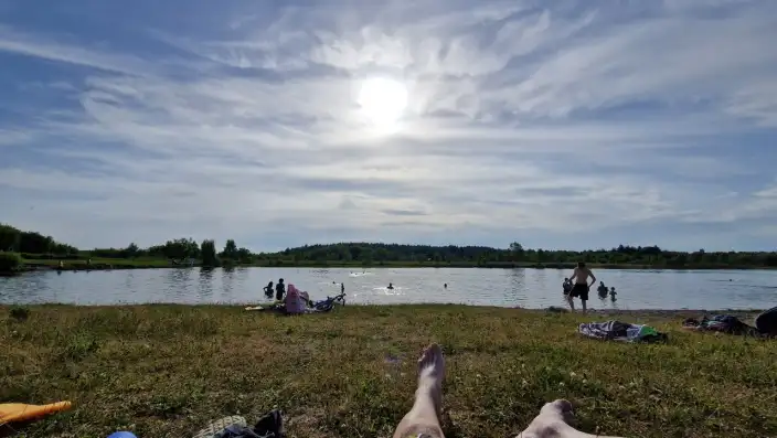 People swimming and enjoying the sun